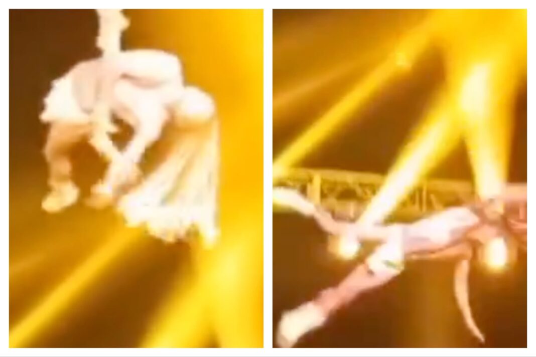 Acróbata realizando una rutina en tela aérea en un circo (ilustrativa).